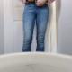 A girl pulls down her pants, then records herself from a rear perspective as she takes a firm shit and a piss into a toilet. She wipes her ass when finished. This girl is very pretty but does not show her face in this clip. 720P HD. Over 2 minutes.